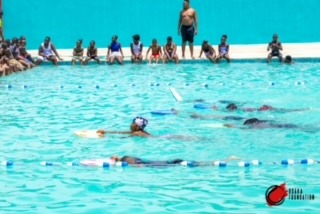 Campers warming up at the Osaka pool